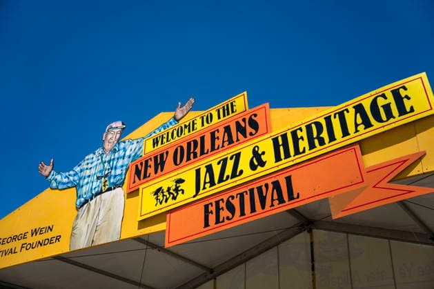 The entrance to the New Orleans Jazz and Heritage Festival is seen at the Fairgrounds Race Courts and Slots in New Orleans, Louisiana on Sunday, May 3, 2026. Organizers expected about 400,000 to attend, but the finally tally, which won t be available for a few days, may be impacted by rain that interrupted festival operations Thursday and Friday.  NOL20260503301 BONNIExCASH