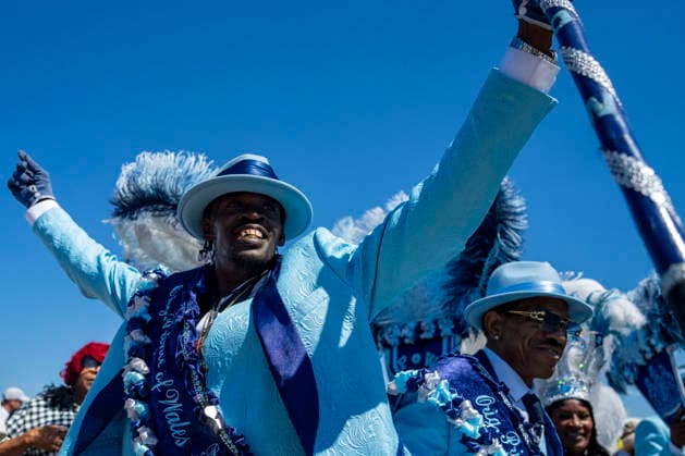 Members of the Zulu Social Aid and Pleasure Club walking group parade through the New Orleans Jazz and Heritage Festival at the Fairgrounds Race Courts and Slots in New Orleans, Louisiana on Sunday, May 3, 2026. Organizers expected about 400,000 to attend, but the finally tally, which won t be available for a few days, may be impacted by rain that interrupted festival operations Thursday and Friday.  NOL20260503312 BONNIExCASH