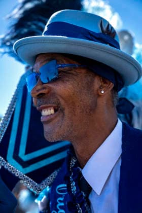 A member of the Zulu Social Aid and Pleasure Club walking group parades through the New Orleans Jazz and Heritage Festival at the Fairgrounds Race Courts and Slots in New Orleans, Louisiana on Sunday, May 3, 2026. Organizers expected about 400,000 to attend, but the finally tally, which won t be available for a few days, may be impacted by rain that interrupted festival operations Thursday and Friday.  NOL20260503322 BONNIExCASH