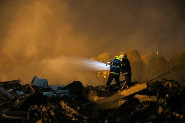 (260505) -- CHANGSHA, May 5, 2026 -- Rescuers work on site after an explosion at a fireworks plant in Guandu Town of Liuyang, central China s Hunan Province, May 5, 2026. Three people were killed, and 25 others were injured, including two in serious condition, after an explosion hit a fireworks plant in central China s Hunan Province on Monday, according to a local emergency management bureau. The explosion occurred at around 4:43 p.m. at the plant in Liuyang, a county-level city under Changsha, capital city of Hunan. After the accident, local emergency and fire rescue forces rushed to the scene to carry out rescue operations, which are still underway. ) (SpotNews) CHINA-HUNAN-LIUYANG-FIREWORKS PLANT-EXPLOSION (CN) ChenxSihan 