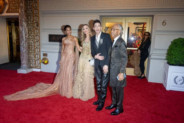 The Pierre Hotel: 2026 Met Gala Departures, New York, USA - 04 May 2026 (L-R) Aisha McShaw, Georgina Chapman, Adrien Brody and Rev. Al Sharpton depart the Pierre Hotel for 2026 Met Gala on May 04, 2026 in New York City. New York United States Copyright: xRonxAdarx xSOPAxImagesx _radar_pierre_20260504_01086