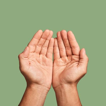Hands, welfare and poverty with a man in studio on a green background begging for help or support. Hope, community and palm cupping with a person closeup asking for humanitarian aid or kindness. (License=RF)  Copyright: xZoonar.com YurixArcursxpeopleimages.comx 19961932