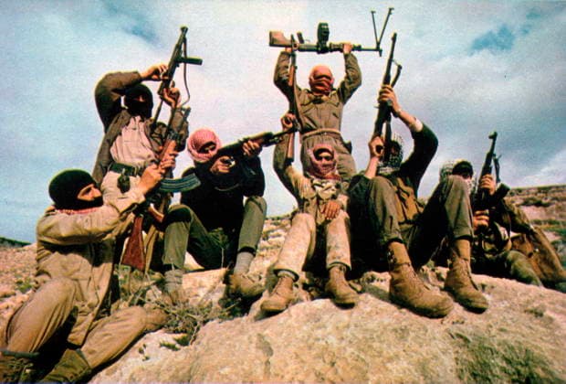RECORD DATE NOT STATED A photograph of a Popular Front for the Liberation of Palestine patrol in the mountains east of the Jordan River. A photograph of a patrol from the Popular Front for the Liberation of Palestine, in the mountains east of the Jordan River, punctuating a battle hymn by discharging Soviet, Czechoslovakian (VZ. 58), and Egyptian weapons. The Popular Front for the Liberation of Palestine (PFLP) was a prominent Marxist-Leninist Palestinian nationalist organisation founded in 1967 that gained significant influence following the 1967 Six-Day War, operating from bases in Jordan. Thomas R Koeniges, 1969. Editorial use only. All other uses to be cleared with the copyright owner (World History Archive), in advance., WHA_011_0264.j Copyright: xx