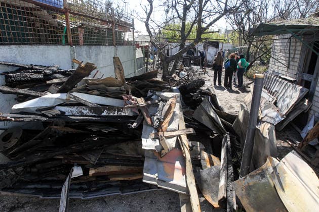 Debris is piled in the yard of a house damaged by a Russian drone strike, Dnipro, Ukraine, May 5, 2026. As a result of the attack, one person was injured. Three private houses and a critical infrastructure facility were also damaged in the city. (Photo by Mykola Miakshykov Ukrinform) Russian drone strike hits residential area in Dnipro  Copyright: xMykolaxMiakshykovx