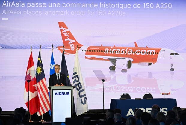 May 6, 2026, Mirabel, Pq, Canada: Prime Minister Mark Carney speaks during an event at the Airbus A220 Delivery Center in Mirabel, Que., Wednesday, May 6, 2026. AirAsia placed a landmark order for 150 Airbus A220 aircraft. Mirabel Canada  - ZUMAc35_ 20260506_zaf_c35_176 Copyright: xGrahamxHughesx