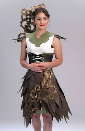 May 07,, 2026 - Denver, Colorado, USA - A model strikes a pose at the 20th Annual Denver Paper Fashion Show. Using only paper to create haute couture, fashion designers created dozens of wearable art designs for this year s show themed Folded in Time. Produced by the One Club for Creativity Denver, the runway show is a fundraiser for Downtown Aurora Visual Arts, which provides after-school arts programs for local youth. Denver USA  - ZUMAce6_ 20260507_zaf_ce6_007 Copyright: xBrianxCahnx