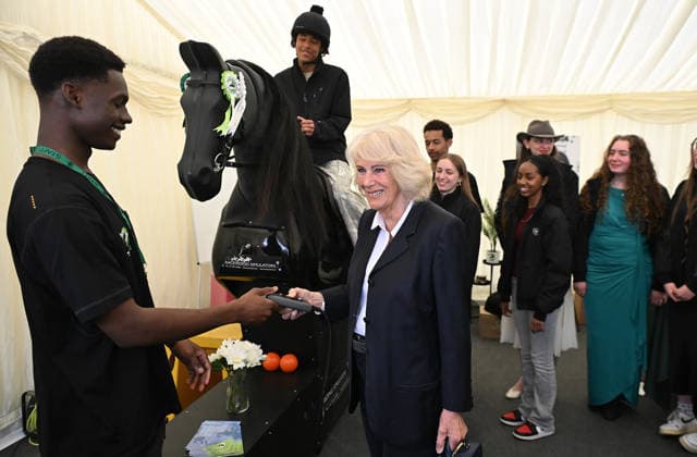 Queen Camilla meets Ebony Horse Club members Her Majesty, Queen Camilla, President of the Ebony Horse Club and Patron of the British Equestrian Federation, will meet members of the Ebony Horse Club as they demonstrate their skills during a short display at Badminton Horse Trials, which has selected Ebony Horse Club as its chosen charity this year. The Queen will also meet Badminton Horse Trials supporter and guests, including riders, past winners and representatives from the British Equestrian Federation. PIC: HRH The Queen meets riders and volunteers from Ebony Horse Club. Jason Hawkes (17) on the horse and Maxim Lawrence-Botu (22) youth worker., Credit:Eddie Mulholland PA ROTA - B68 Avalon UK, Badminton  Copyright: xEddiexMulhollandx xPAxROTAx-xB68x xAvalonx 1097354371