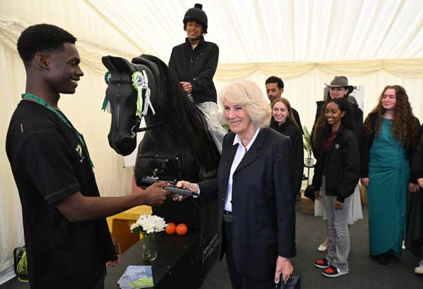 Queen Camilla meets Ebony Horse Club members Her Majesty, Queen Camilla, President of the Ebony Horse Club and Patron of the British Equestrian Federation, will meet members of the Ebony Horse Club as they demonstrate their skills during a short display at Badminton Horse Trials, which has selected Ebony Horse Club as its chosen charity this year. The Queen will also meet Badminton Horse Trials supporter and guests, including riders, past winners and representatives from the British Equestrian Federation. PIC: HRH The Queen meets riders and volunteers from Ebony Horse Club. Jason Hawkes (17) on the horse and Maxim Lawrence-Botu (22) youth worker., Credit:Eddie Mulholland PA ROTA - B68 Avalon UK, Badminton  Copyright: xEddiexMulhollandx xPAxROTAx-xB68x xAvalonx 1097354394