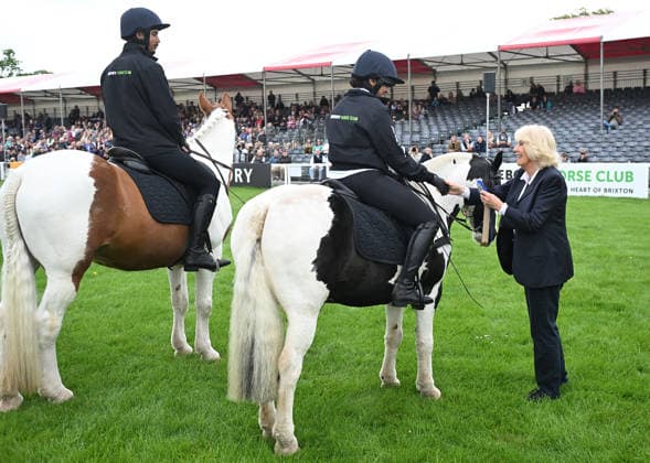 Queen Camilla meets Ebony Horse Club members Her Majesty, Queen Camilla, President of the Ebony Horse Club and Patron of the British Equestrian Federation, will meet members of the Ebony Horse Club as they demonstrate their skills during a short display at Badminton Horse Trials, which has selected Ebony Horse Club as its chosen charity this year. The Queen will also meet Badminton Horse Trials supporter and guests, including riders, past winners and representatives from the British Equestrian Federation. PIC: HRH The Queen meets riders from Ebony Horse Club after their display and awards them Rosettes., Credit:Eddie Mulholland PA ROTA - B68 Avalon UK, Badminton  Copyright: xEddiexMulhollandx xPAxROTAx-xB68x xAvalonx 1097354408