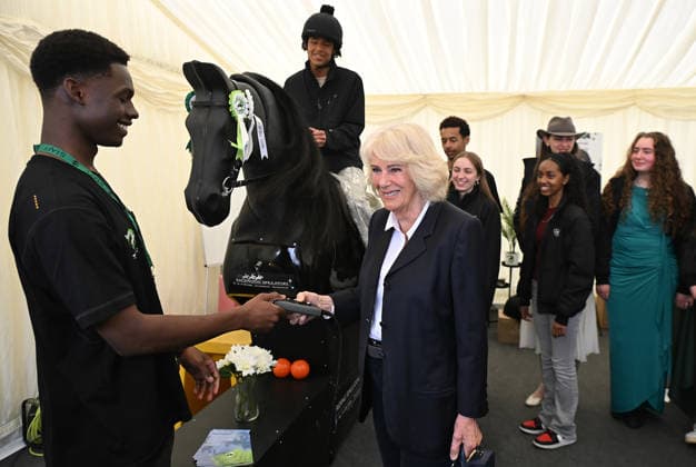 Queen Camilla meets Ebony Horse Club members Her Majesty, Queen Camilla, President of the Ebony Horse Club and Patron of the British Equestrian Federation, will meet members of the Ebony Horse Club as they demonstrate their skills during a short display at Badminton Horse Trials, which has selected Ebony Horse Club as its chosen charity this year. The Queen will also meet Badminton Horse Trials supporter and guests, including riders, past winners and representatives from the British Equestrian Federation. PIC: HRH The Queen meets riders and volunteers from Ebony Horse Club. Jason Hawkes (17) on the horse and Maxim Lawrence-Botu (22) youth worker., Credit:Eddie Mulholland PA ROTA - B68 Avalon UK, Badminton  Copyright: xEddiexMulhollandx xPAxROTAx-xB68x xAvalonx 1097354420
