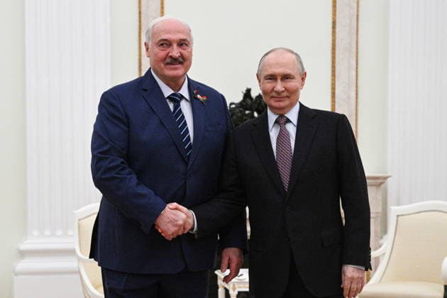RUSSIA, MOSCOW - MAY 8, 2026: Russia s President Vladimir Putin (R) and Belarus President Alexander Lukashenko shake hands during a meeting at the Moscow Kremlin. Alexander Kazakov Russian Presidential Press and Information Office TASS  92201319