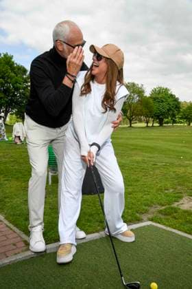 ABB PROMIGOLF Simone Thomalla friend Rene Merten teeing off, guest at the first charity celebrity AM golf tournament for the benefit of Kinderwohl Berlin and Geka e V at the Golf and Country Club am Motzener See in Mittenwalde Brandenburg on 09 05 2026 Brandenburg Germany