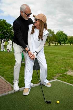 ABB PROMIGOLF Simone Thomalla friend Rene Merten teeing off, guest at the first charity celebrity AM golf tournament for the benefit of Kinderwohl Berlin and Geka e V at the Golf and Country Club am Motzener See in Mittenwalde Brandenburg on 09 05 2026 Brandenburg Germany
