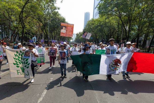 May 10, 2026, Mexico City, Mexico: On Mothers Day, collectives of searching mothers and relatives of missing persons took part in the XIV National Dignity March: Mothers Searching for their Sons, Daughters, Truth and Justice, in Mexico City. The march moved from the Monument to the Mother to the Angel of Independence, where participants demanded answers for missing persons while also protesting against the staging of the 2026 FIFA World Cup amid the countrys disappearance crisis. Mexico City Mexico  - ZUMAl178 20260510_znp_l178_021 Copyright: xCristianxLeyvax