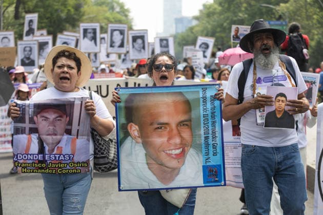 May 10, 2026, Mexico City, Mexico: On Mothers Day, collectives of searching mothers and relatives of missing persons took part in the XIV National Dignity March: Mothers Searching for their Sons, Daughters, Truth and Justice, in Mexico City. The march moved from the Monument to the Mother to the Angel of Independence, where participants demanded answers for missing persons while also protesting against the staging of the 2026 FIFA World Cup amid the countrys disappearance crisis. Mexico City Mexico  - ZUMAl178 20260510_znp_l178_030 Copyright: xCristianxLeyvax