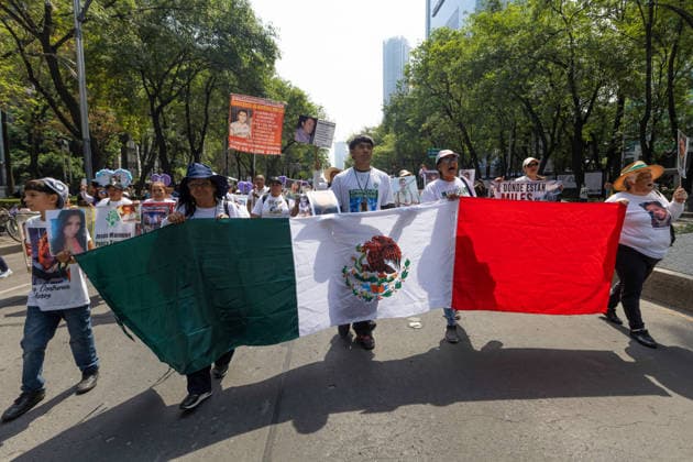 May 10, 2026, Mexico City, Mexico: On Mothers Day, collectives of searching mothers and relatives of missing persons took part in the XIV National Dignity March: Mothers Searching for their Sons, Daughters, Truth and Justice, in Mexico City. The march moved from the Monument to the Mother to the Angel of Independence, where participants demanded answers for missing persons while also protesting against the staging of the 2026 FIFA World Cup amid the countrys disappearance crisis. Mexico City Mexico - ZUMAl178 20260510_znp_l178_024 Copyright: xCristianxLeyvax