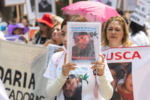 May 10, 2026, Mexico City, Mexico: On Mothers Day, collectives of searching mothers and relatives of missing persons took part in the XIV National Dignity March: Mothers Searching for their Sons, Daughters, Truth and Justice, in Mexico City. The march moved from the Monument to the Mother to the Angel of Independence, where participants demanded answers for missing persons while also protesting against the staging of the 2026 FIFA World Cup amid the countrys disappearance crisis. Mexico City Mexico - ZUMAl178 20260510_znp_l178_025 Copyright: xCristianxLeyvax