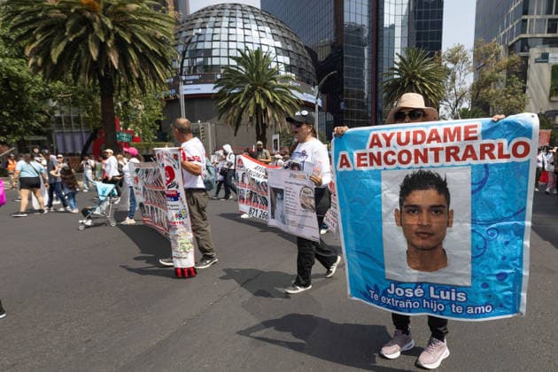 May 10, 2026, Mexico City, Mexico: On Mothers Day, collectives of searching mothers and relatives of missing persons took part in the XIV National Dignity March: Mothers Searching for their Sons, Daughters, Truth and Justice, in Mexico City. The march moved from the Monument to the Mother to the Angel of Independence, where participants demanded answers for missing persons while also protesting against the staging of the 2026 FIFA World Cup amid the countrys disappearance crisis. Mexico City Mexico  - ZUMAl178 20260510_znp_l178_040 Copyright: xCristianxLeyvax