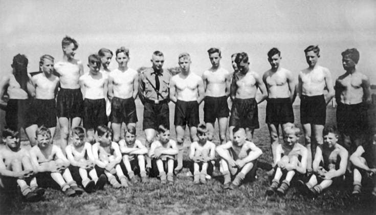 RECORD DATE NOT STATED Nazi boys at a summer training camp in Germany, 1936 Group of Hitler Youth Nazi boys at a summer training camp in Germany, 1936 Editorial use only. All other uses to be cleared with the copyright owner (World History Archive), in advance., WHA_064_0608.jpg, Hitler Youth; Nazi boys; summer training camp; Germany; 1936; historical; youth organization; indoctrination; propaganda; uniformed boys; swastika armbands; group; young men; military training; fascist regime; Adolf Hitler; Third Reich; World War II; nationalism; brainwashing; political ideology; paramilitary organization; Aryan race; totalitarianism; indoctrinated youth; Nazi Germany; fascist youth; Hitlerjugend; summer camp; German history Copyright: xWorldxHistoryxArchivex