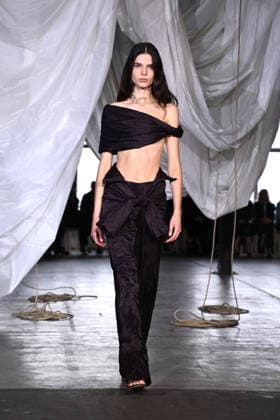 AUSTRALIAN FASHION WEEK, A model walks the runway wearing creations by Australian designer Bianca Spender, during Australian Fashion Week in Sydney, Tuesday, May 12, 2026. ( NO ARCHIVING SYDNEY NEW SOUTH WALES AUSTRALIA  Copyright: xDANxHIMBRECHTSx 20260512143874605685