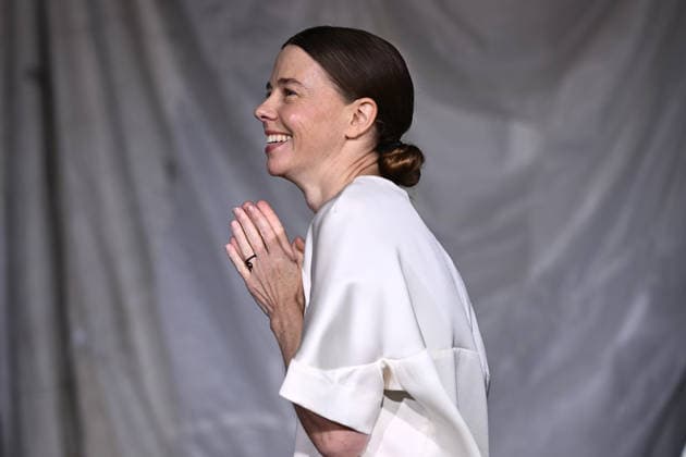 AUSTRALIAN FASHION WEEK, Australian designer Bianca Spender gestures to the audience after presenting her runway show, during Australian Fashion Week in Sydney, Tuesday, May 12, 2026. ( NO ARCHIVING SYDNEY NEW SOUTH WALES AUSTRALIA  Copyright: xDANxHIMBRECHTSx 20260512119461139268