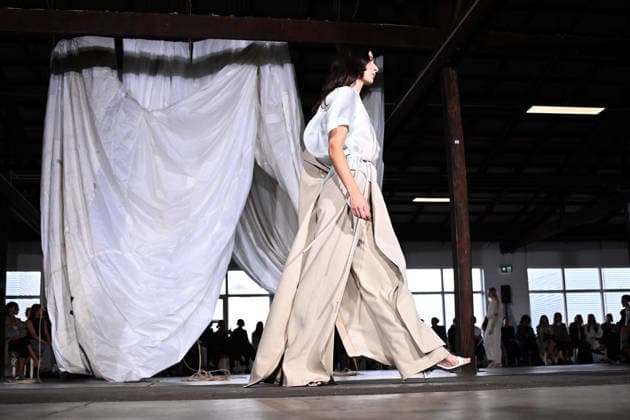 AUSTRALIAN FASHION WEEK, A model walks the runway wearing creations by Australian designer Bianca Spender, during Australian Fashion Week in Sydney, Tuesday, May 12, 2026. ( NO ARCHIVING SYDNEY NEW SOUTH WALES AUSTRALIA  Copyright: xDANxHIMBRECHTSx 20260512165975064021