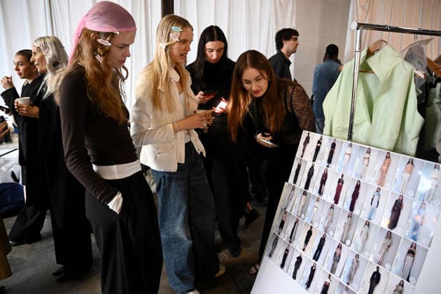 AUSTRALIAN FASHION WEEK, Models prepare backstage ahead of the runway show by Australian designer Bianca Spender, during Australian Fashion Week in Sydney, Tuesday, May 12, 2026. ( NO ARCHIVING SYDNEY NEW SOUTH WALES AUSTRALIA  Copyright: xDANxHIMBRECHTSx 20260512148099707891