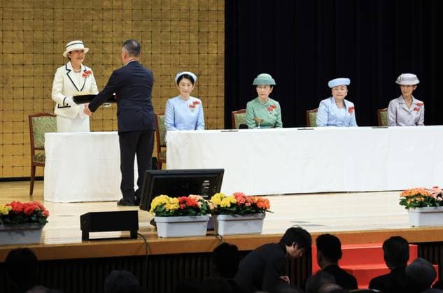 Japan Empress Masako at Red Cross event Japanese Empress Masako (L) attends a Japanese Red Cross Society event in Tokyo on May 12, 2026, along with other members of the imperial family. (Pool photo)  A14AA0005543808P