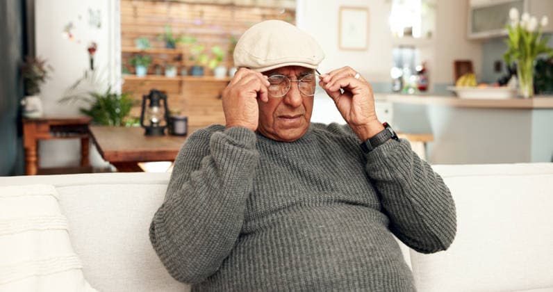 Senior man, pain and glasses on couch in home living room, eye strain and fatigue in lounge. Prescription, tired and retirement for frustrated male person, brain fog and tension or headache pressure. (License=RF) ,model released, Symbolfoto  Copyright: xZoonar.com YurixArcursxpeopleimages.comx 21957258 ,model released, Symbolfoto ,property released