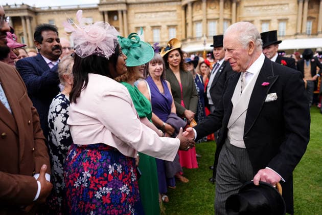 Royal Garden Party at Buckingham Palace King Charles III (right) greets guests during a Royal Garden Party at Buckingham Palace, London, to celebrate frontline workers from across the United Kingdom and recognise the dedication and contribution of those who serve their communities through volunteering, supporting charitable causes and working for emergency services. Picture date: Tuesday May 12, 2026., Credit:Aaron Chown PA ROTA - B68 Avalon UK, London  Copyright: xAaronxChownx xPAxROTAx-xB68x xAvalonx 1098334749