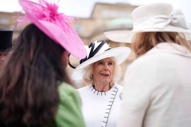 Royal Garden Party at Buckingham Palace Queen Camilla greets guests during a Royal Garden Party at Buckingham Palace, London, to celebrate frontline workers from across the United Kingdom and recognise the dedication and contribution of those who serve their communities through volunteering, supporting charitable causes and working for emergency services. Picture date: Tuesday May 12, 2026., Credit:Aaron Chown PA ROTA - B68 Avalon UK, London  Copyright: xAaronxChownx xPAxROTAx-xB68x xAvalonx 1098334834