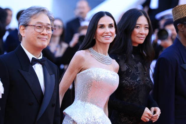Cannes - Opening Ceremony Red Carpet Jury President Park Chan-wook and Jury Members Demi Moore and Chloe Zhao attending the Opening Ceremony red carpet ahead of the screening of The Electric Kiss (La Venus Electrique) directed by Pierre Salvadori as part of the 79th Cannes Film Festival in Cannes, France on May 12, 2026. Photo by Jerome Domine ABACAPRESS.COM Cannes France  Copyright: xDominexJerome ABACAx