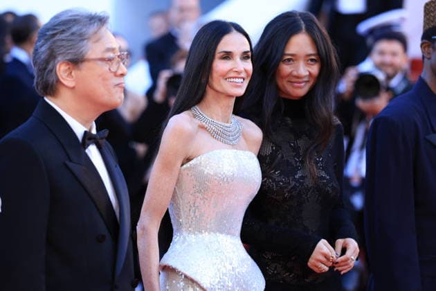 Cannes - Opening Ceremony Red Carpet Jury President Park Chan-wook and Jury Members Demi Moore and Chloe Zhao attending the Opening Ceremony red carpet ahead of the screening of The Electric Kiss (La Venus Electrique) directed by Pierre Salvadori as part of the 79th Cannes Film Festival in Cannes, France on May 12, 2026. Photo by Jerome Domine ABACAPRESS.COM Cannes France  Copyright: xDominexJerome ABACAx