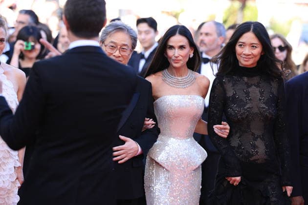 Cannes - Opening Ceremony Red Carpet Jury President Park Chan-wook and Jury Members Demi Moore and Chloe Zhao attending the Opening Ceremony red carpet ahead of the screening of The Electric Kiss (La Venus Electrique) directed by Pierre Salvadori as part of the 79th Cannes Film Festival in Cannes, France on May 12, 2026. Photo by Jerome Domine ABACAPRESS.COM Cannes France  Copyright: xDominexJerome ABACAx