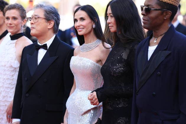 Cannes - Opening Ceremony Red Carpet Jury President Park Chan-wook and Jury Members Demi Moore and Chloe Zhao attending the Opening Ceremony red carpet ahead of the screening of The Electric Kiss (La Venus Electrique) directed by Pierre Salvadori as part of the 79th Cannes Film Festival in Cannes, France on May 12, 2026. Photo by Jerome Domine ABACAPRESS.COM Cannes France  Copyright: xDominexJerome ABACAx