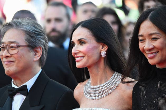 IPA84604454 - Cannes, 79th Cannes Film Festival 2026, red carpet di apertura Nella foto: Park Chan-wook , Demi Moore  Copyright: xManuelexMangiarottix xPoolxPhotoxEventsx07x 84604454