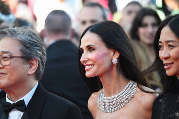 IPA84604456 - Cannes, 79th Cannes Film Festival 2026, red carpet di apertura Nella foto: Park Chan-wook , Demi Moore  Copyright: xManuelexMangiarottix xPoolxPhotoxEventsx07x 84604456