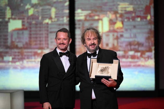Cannes - Opening Ceremony Peter Jackson (R) receives the Honorary Palme d Or from Elijah Wood (L) during the Opening Ceremony as part of the 79th Cannes Film Festival in Cannes, France on May 12, 2026. Photo by Eliot Blondet ABACAPRESS.COM Cannes France  Copyright: xBlondetxEliot ABACAx