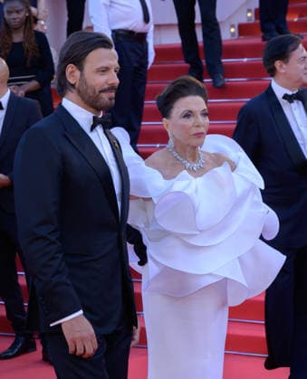 Electric Kiss Premiere at 79th Festival de Cannes - Cannes, France CANNES, FRANCE. May 12, 2026: Joan Collins & Laurent Lafitte at the Grand Opening and premiere for The Electric Kiss at the 79th Festival de Cannes. Picture: Paul Smith Featureflash Cannes France  Copyright: xPaulxSmithx xFeatureflashx