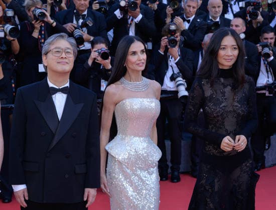 CANNES, FRANCE May 12, 2026 Park Chan Wook, Demi Moore Chloe Zhao at the Grand Opening and premiere for The Electric Kiss at the 79th Festival de Cannes Picture Paul Smith Featureflash 455849 2026 05 12 Cannes France  Copyright: xPaulxSmithx xFeaturesxFlashx xStarfacex STAR_455849_171