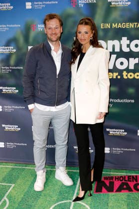 Marc Schlömer and Laura Wontorra at the premiere screening of the Magenta TV documentary series Wontorras World Cup Father Daughter World Cup at the Telekom Flagship Store Hamburg, 12 05 2026 Foto:xC.xTamckex xFuturexImagex wontorra_6501