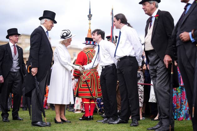 Royal Garden Party hosted by King Charles and Queen Camilla at Buckingham Palace, London, UK, 12 May 2026 Queen Camilla (centre left) greets guests during a Royal Garden Party at Buckingham Palace, London, to celebrate frontline workers from across the United Kingdom and recognise the dedication and contribution of those who serve their communities through volunteering, supporting charitable causes and working for emergency services. Picture date: Tuesday May 12, 2026., Credit:Aaron Chown PA ROTA - B68 Avalon UK, London  Copyright: xAaronxChownx xPAxROTAx-xB68x xAvalonx 1098387384