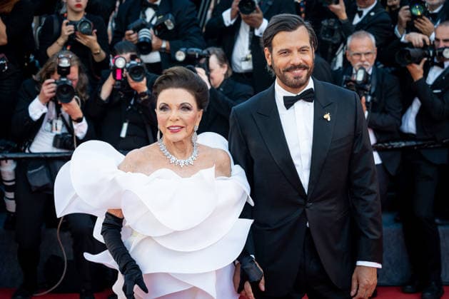May 12, 2026, Cannes, France: Joan Collins and Laurent Lafitte attend the Opening Ceremony red carpet during the 79th Cannes Film Festival at Palais des Festivals in Cannes. Cannes France - ZUMAs197 20260512_aaa_s197_326 Copyright: xStefanoxCostantinox