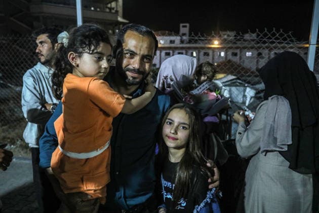 Group of Palestinians return to Gaza via Rafah Border Crossing KHAN YUNIS, GAZA, PALESTINE - MAY 13: A group of Palestinians, including those who received medical treatment in Egypt and their companions, arrive in the city of Khan Yunis, Gaza, Palestine via the Rafah Border Crossing on May 13, 2026. After Israel permitted limited passage, the returning Palestinians were greeted by their families and relatives following their journey back into the Gaza Strip. Abed Rahim Khatib Anadolu Khan Yunis Gaza. Editorial use only. Please get in touch for any other usage.  Copyright: x2026xAnadoluxAbedxRahimxKhatibx