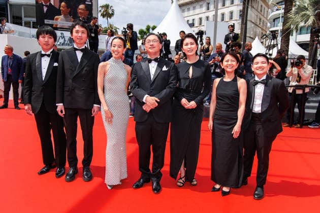 May 13, 2026, Cannes, France: A guest, Terutaro Osanai, Japanese actress Shizuka Ishibashi, Japanese director, screenwriter, editor, and producer Koji Fukada, Japanese actress Takako Matsu and Thai co-Producer Si En Tan attend the red carpet of Nagi Notes at the 79th Cannes Film Festival. Cannes France - ZUMAs197 20260513_aaa_s197_132 Copyright: xMarcoxBaradax