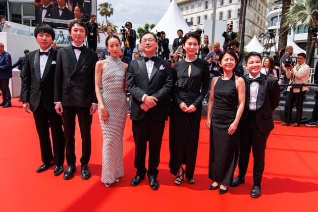 May 13, 2026, Cannes, France: A guest, Terutaro Osanai, Japanese actress Shizuka Ishibashi, Japanese director, screenwriter, editor, and producer Koji Fukada, Japanese actress Takako Matsu and Thai co-Producer Si En Tan attend the red carpet of Nagi Notes at the 79th Cannes Film Festival. Cannes France - ZUMAs197 20260513_aaa_s197_129 Copyright: xMarcoxBaradax