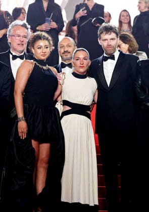 François Kraus, Emma Boumali, Mickaëlle Paty sister of Samuel Paty , Antoine Reinartz Descente des marches du film Labandon lors du 79ème Festival International du Film de Cannes, le 13 mai 2026 Jacovides Moreau Bestimage People leaving the red carpet for Forsaken at the 79th Cannes International Film Festival on May 13, 2026 Cannes France  Copyright: xJACOVIDES-MOREAUx xBESTIMAGExJACOVIDES-MOREAUx xBESTIMAGEx