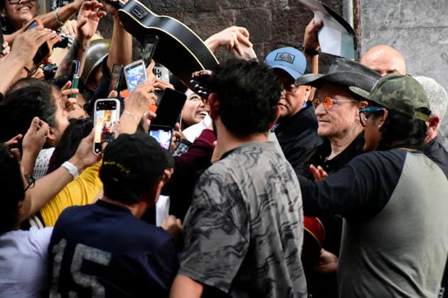May 13, 2026, Mexico City, Ciudad de Mexico, Mexico: Bono lead of the Irish band U2, signs autographs for the fans at the filming set for the upcoming music video Street of Dreams in Mexico City Downtown. on May 13, 2026 in Mexico City, Mexico. Mexico City Mexico - ZUMAe321 20260513_zea_e321_037 Copyright: xLuisxBarronx