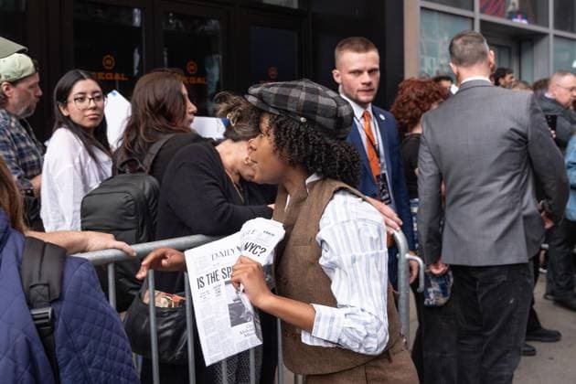 May 13, 2026, Bronx, New York, USA: New York, NY, USA, May 13, 2026: Atmosphere outside of movie theater as actors dressed as paperboys offer fake newspaper ahead of world premiere of Amazon Prime Video s Spider Noir at Regal Times Square. Bronx USA - ZUMAr339 20260513_znp_r339_002 Copyright: xLevxRadinx