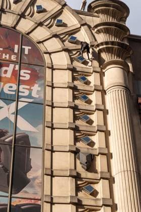 May 13, 2026, Bronx, New York, USA: New York, NY, USA, May 13, 2026: A stunt performer dressed as Nicolas Cage s Spider Noir character climbs movie theater wall ahead of world premiere of Amazon Prime Video s Spider Noir at Regal Times Square. Bronx USA - ZUMAr339 20260513_znp_r339_021 Copyright: xLevxRadinx